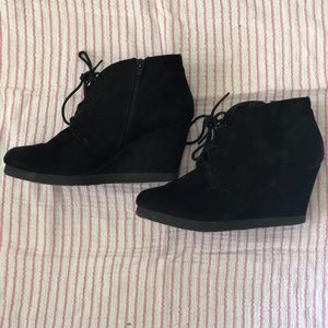 Black wedge booties